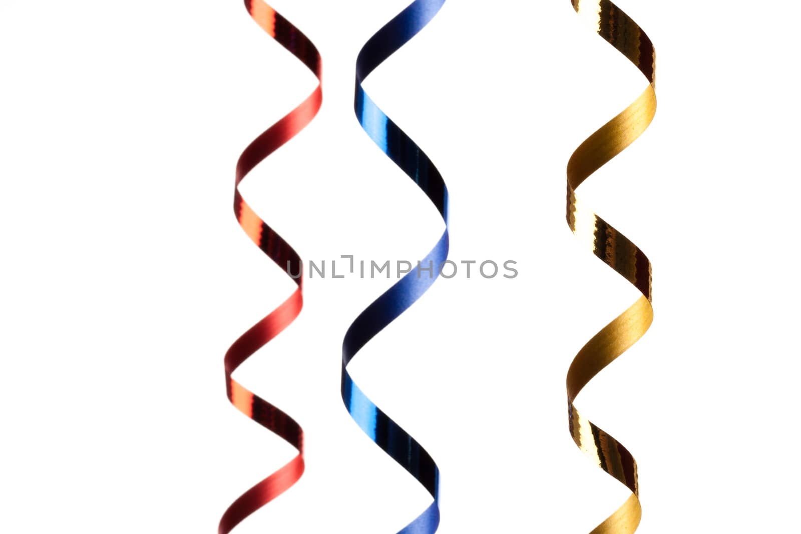 Colorful, curly  streamers isolated on white background