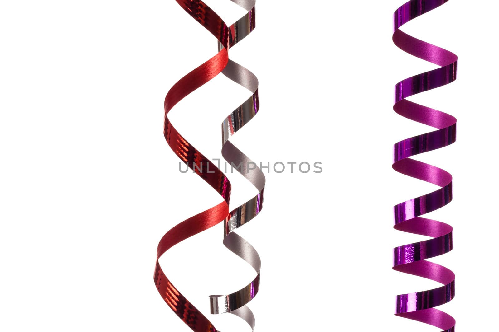 Colorful, curly  streamers isolated on white background