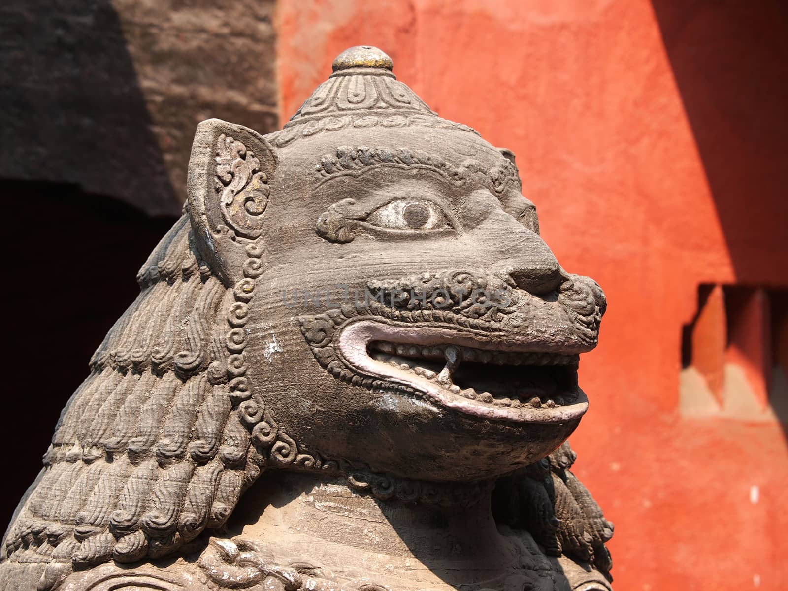 stone guardian lion in buddhist temple     
