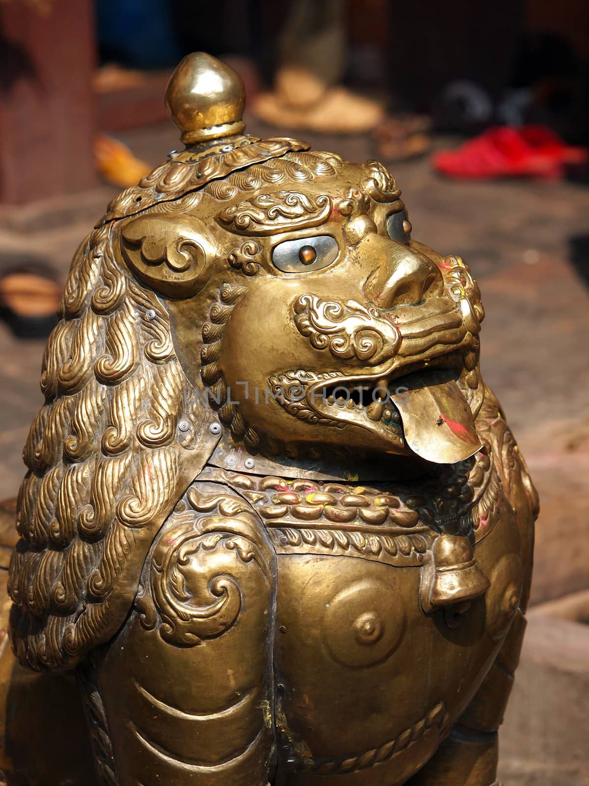 bronze lion guardian in buddhist temple         