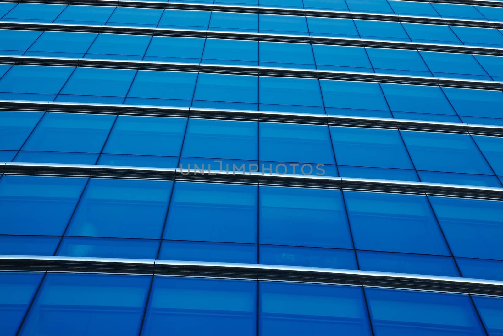 Modern office building detail, glass surface