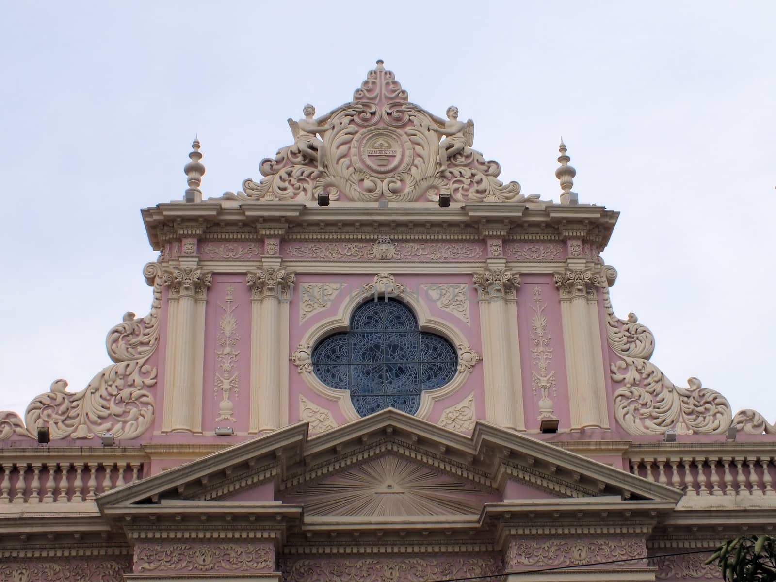 A close up of the pink and cream facade of Salta's cathedral which was built in 1858.