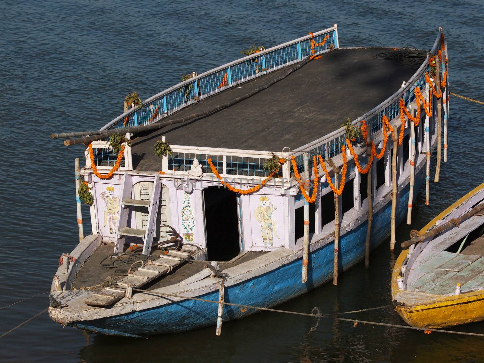 boats in Ganges holy river in Varanasi city, India  