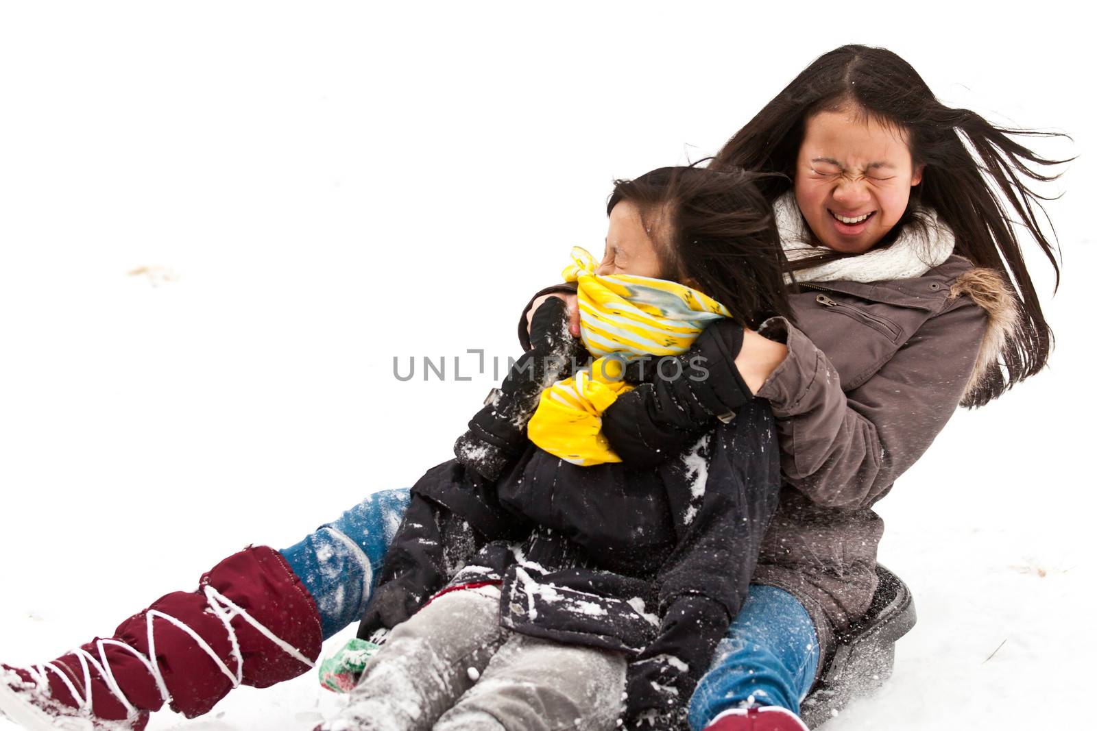 Girl sledging in winter in Denmark