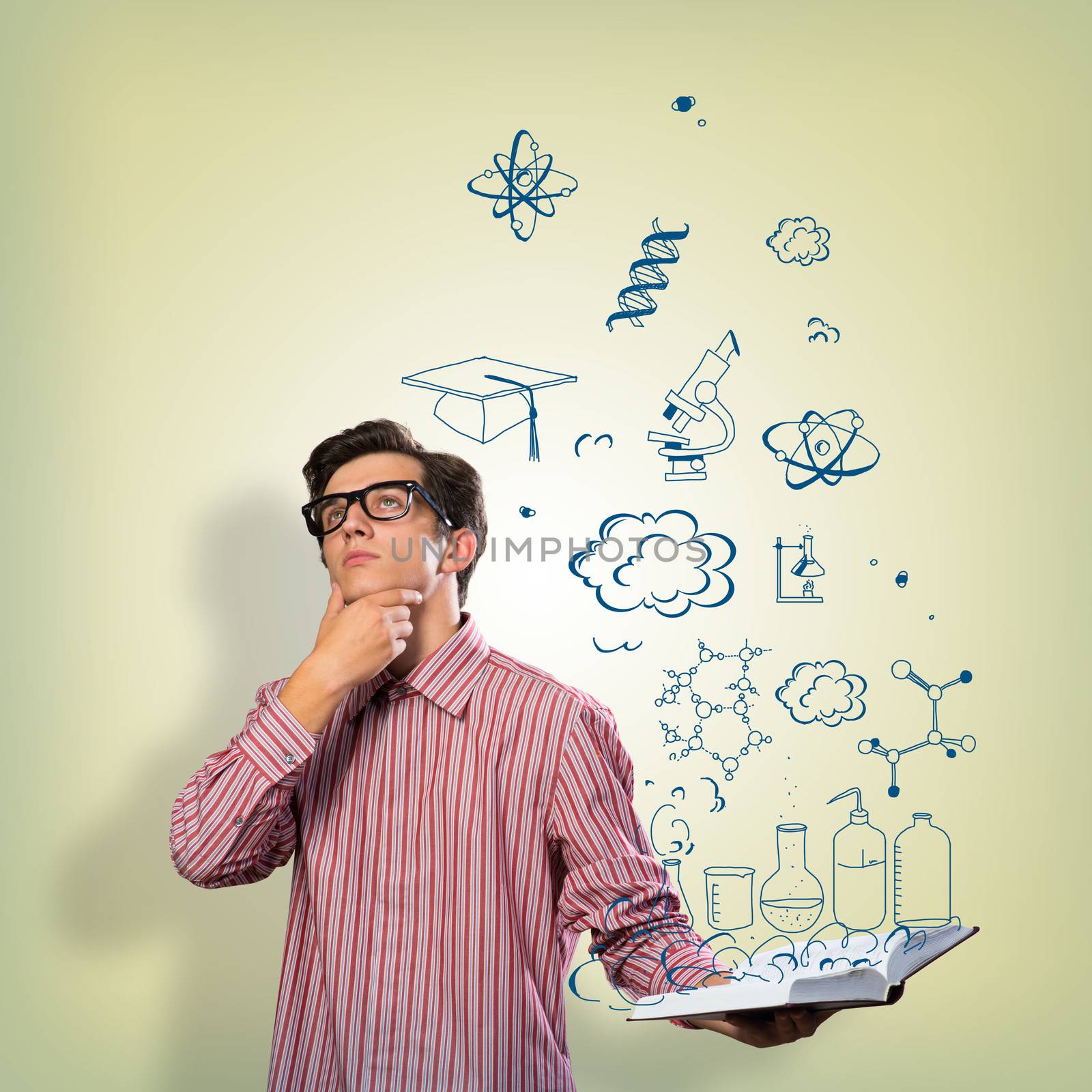 young scientist holding a book by adam121