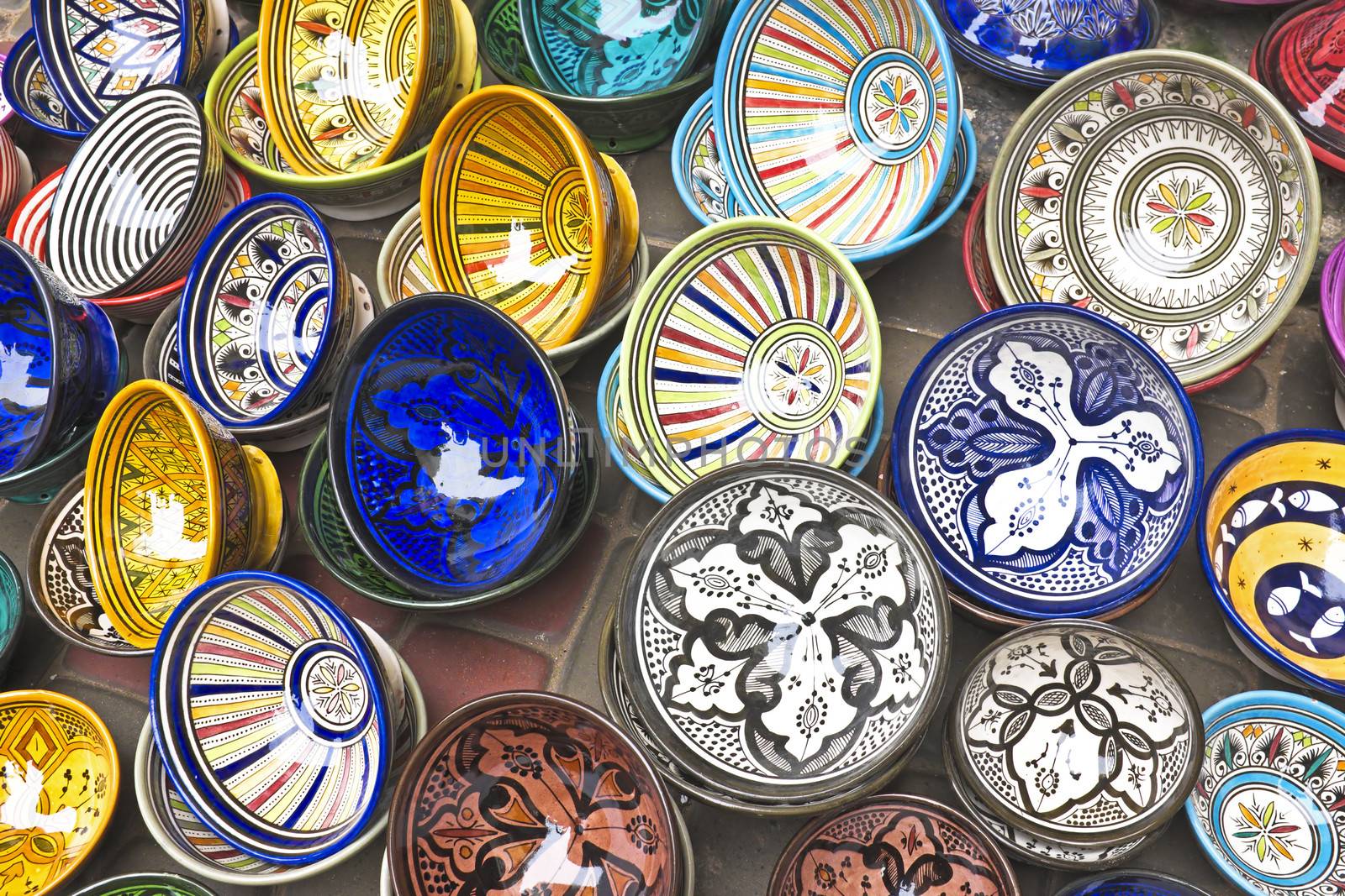 Colorful Tajines for sale in a market stall