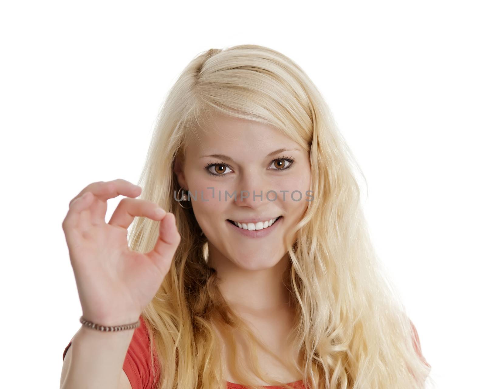 beautiful young blond woman shows o.k.