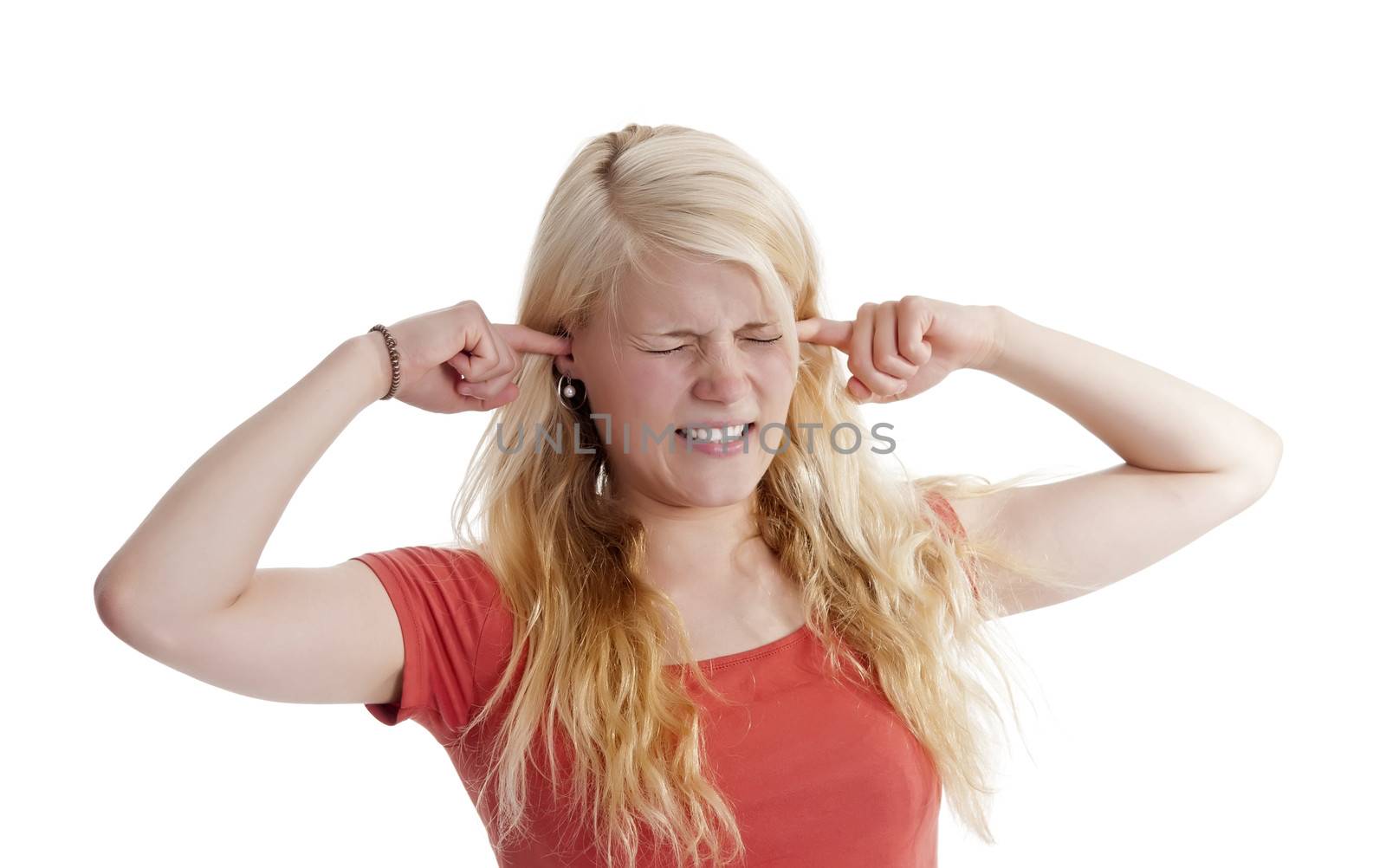 pretty young woman holding her ears with fingers