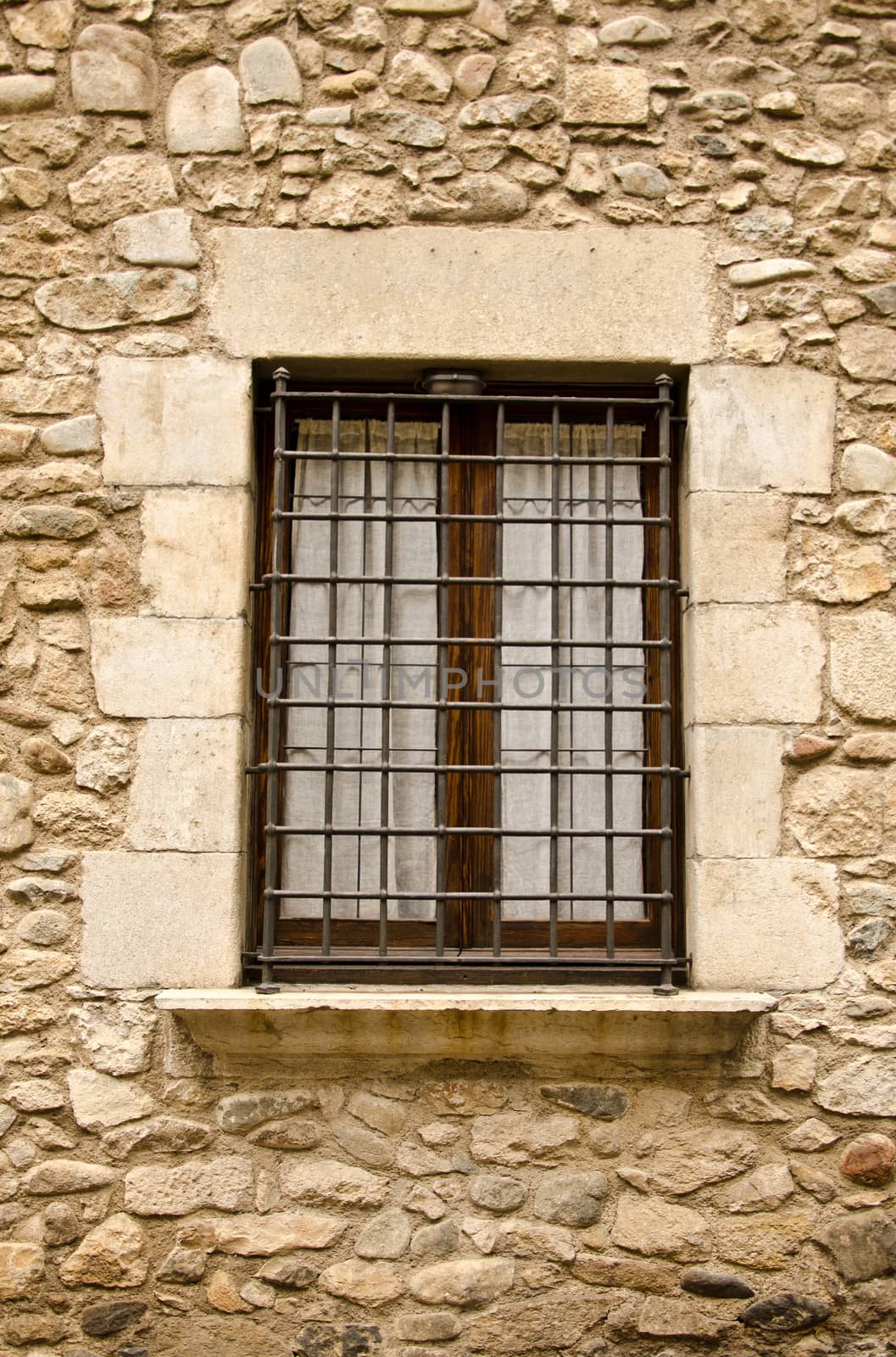 Old wall with window by lauria