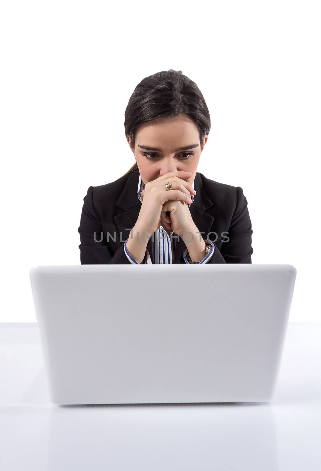 Portrait of stressed and tired young business woman with a laptop computer on white background