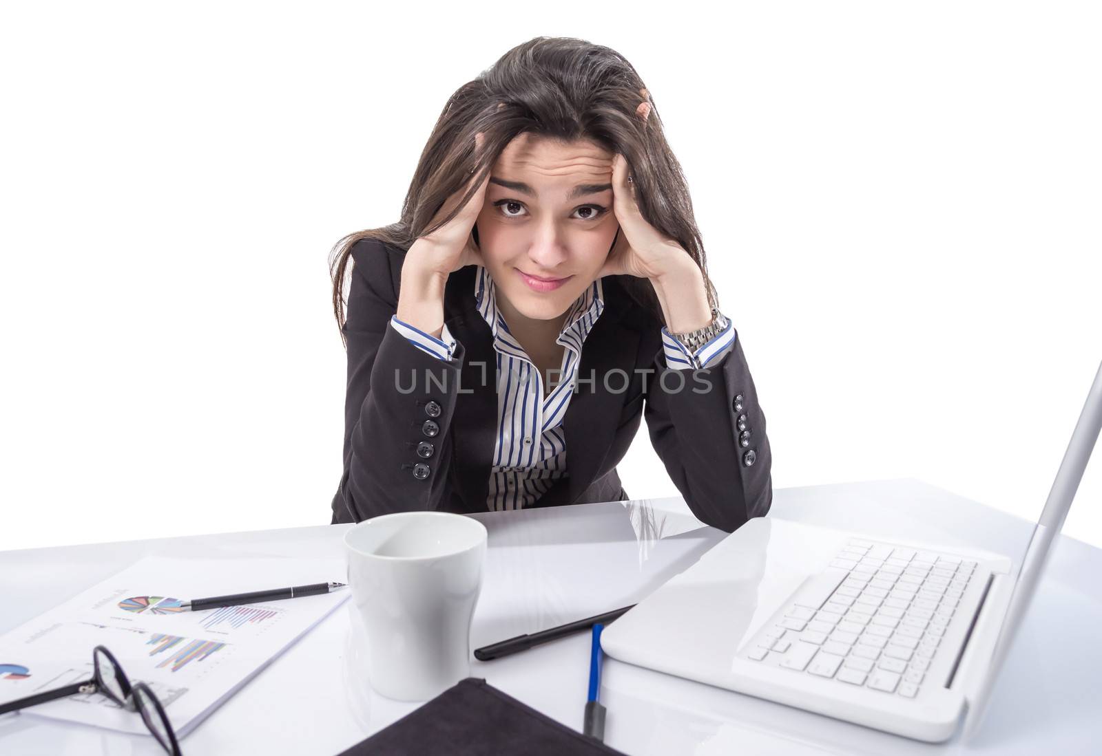 Stressed business woman with hands in her head by doble.d