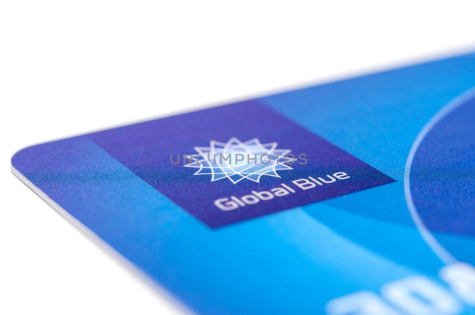 MUNICH, GERMANY - FEBRUAR 20, 2014: Close up plastic card "Global Blue" with logo of tax free company. Isolated on white.