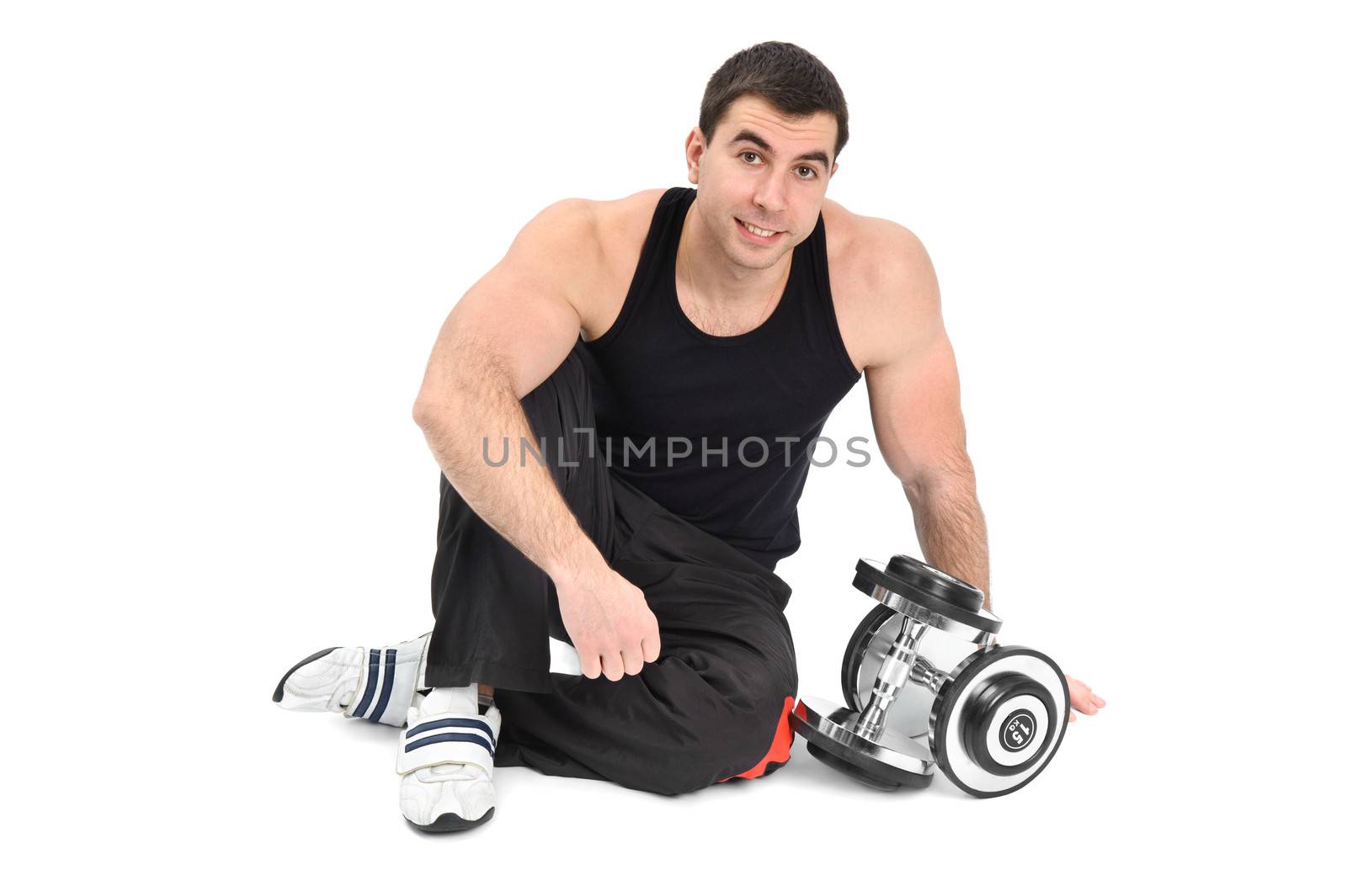 young man posing with dumbbells by starush