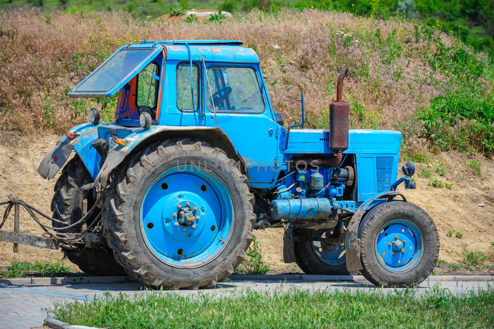 old agriculture tractor outdoors ready for work