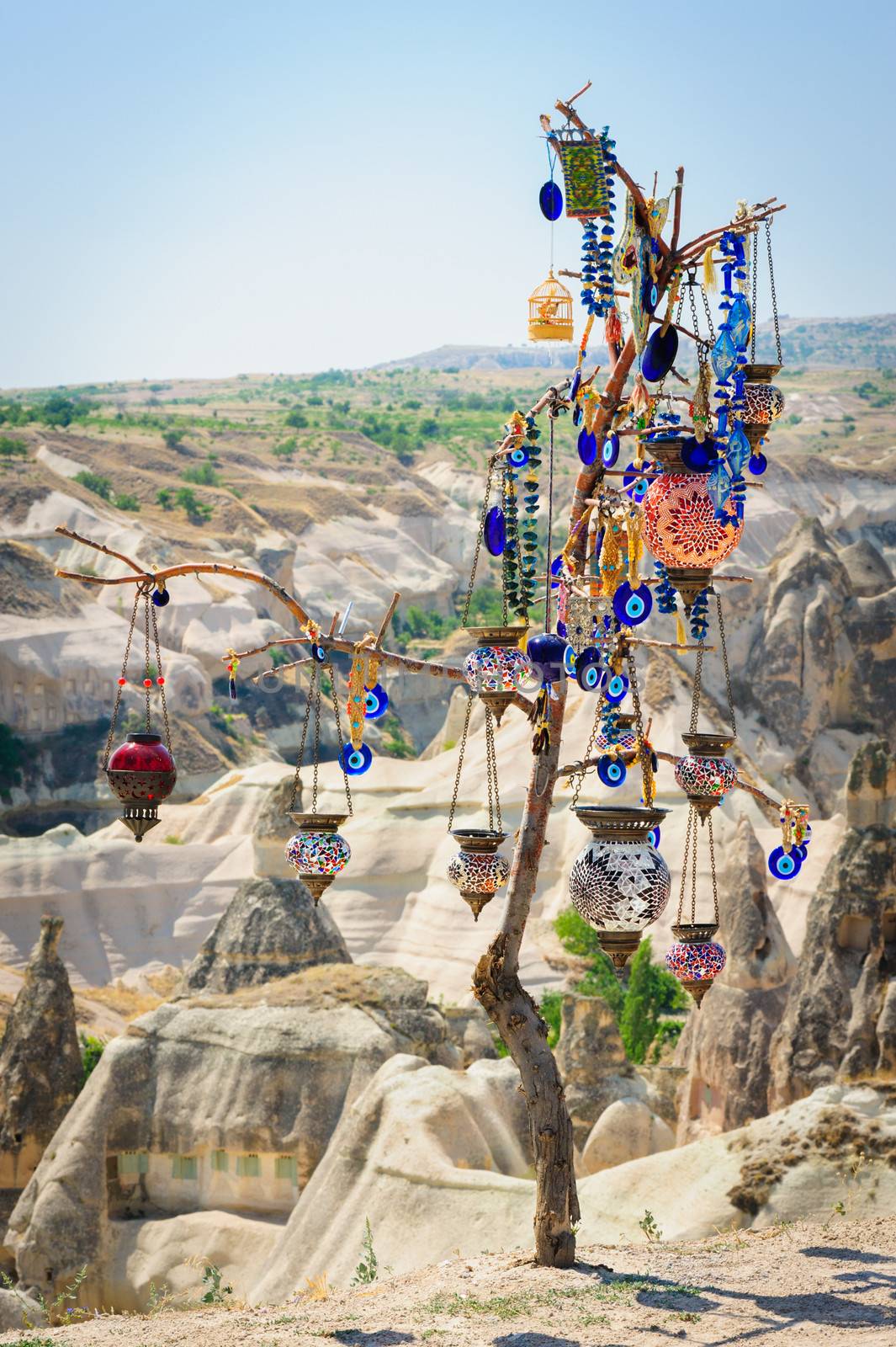Turkish souvenirs hanging on dry tree in Cappadocia
