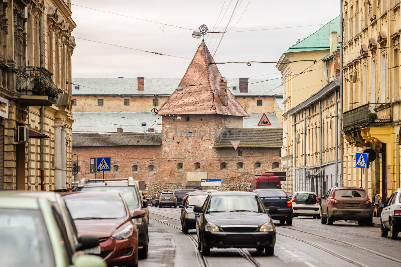 Street view of modern Lviv with old Armory, Ukraine