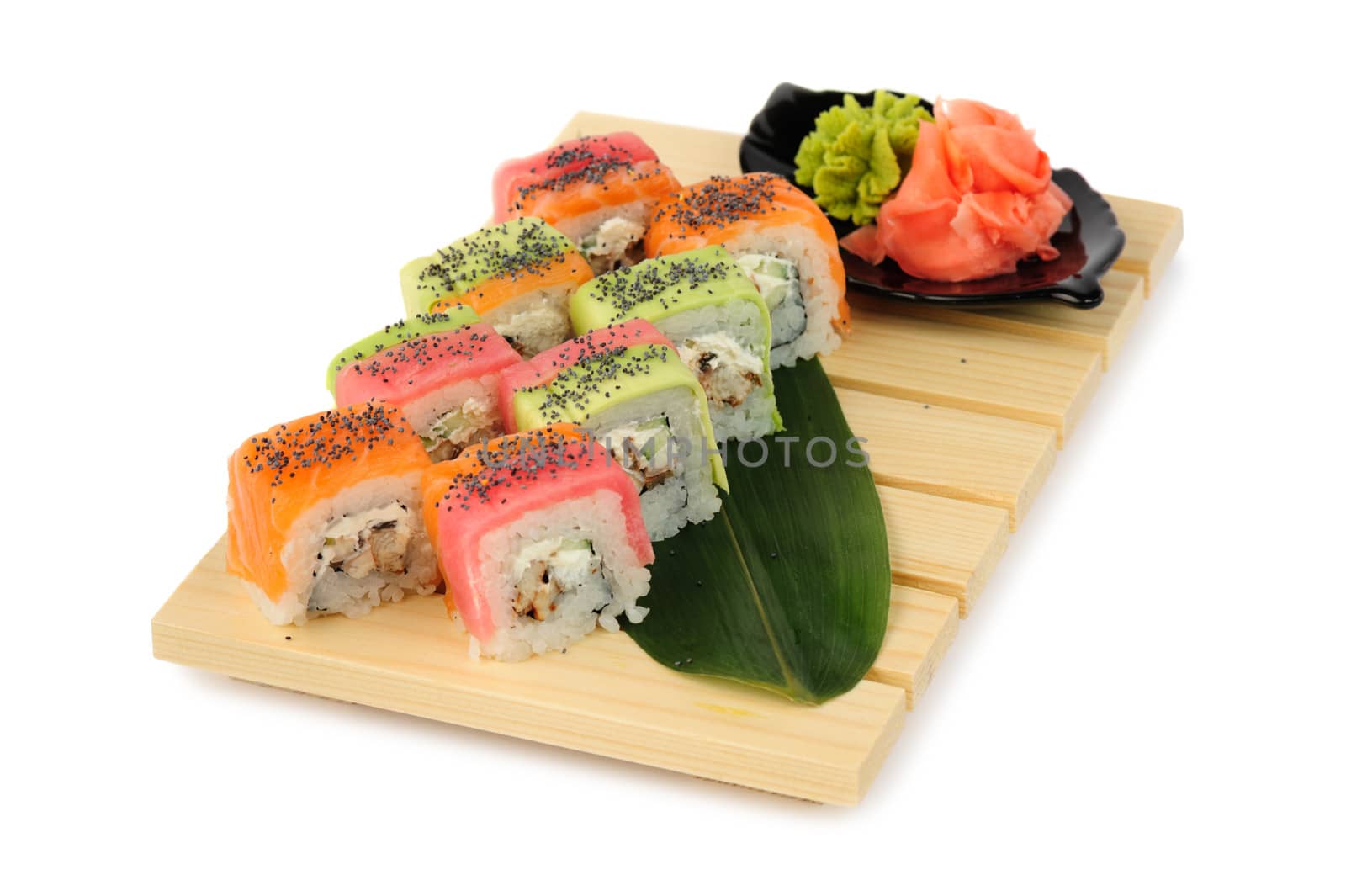 Rainbow sushi at wooden plate, isolated on white