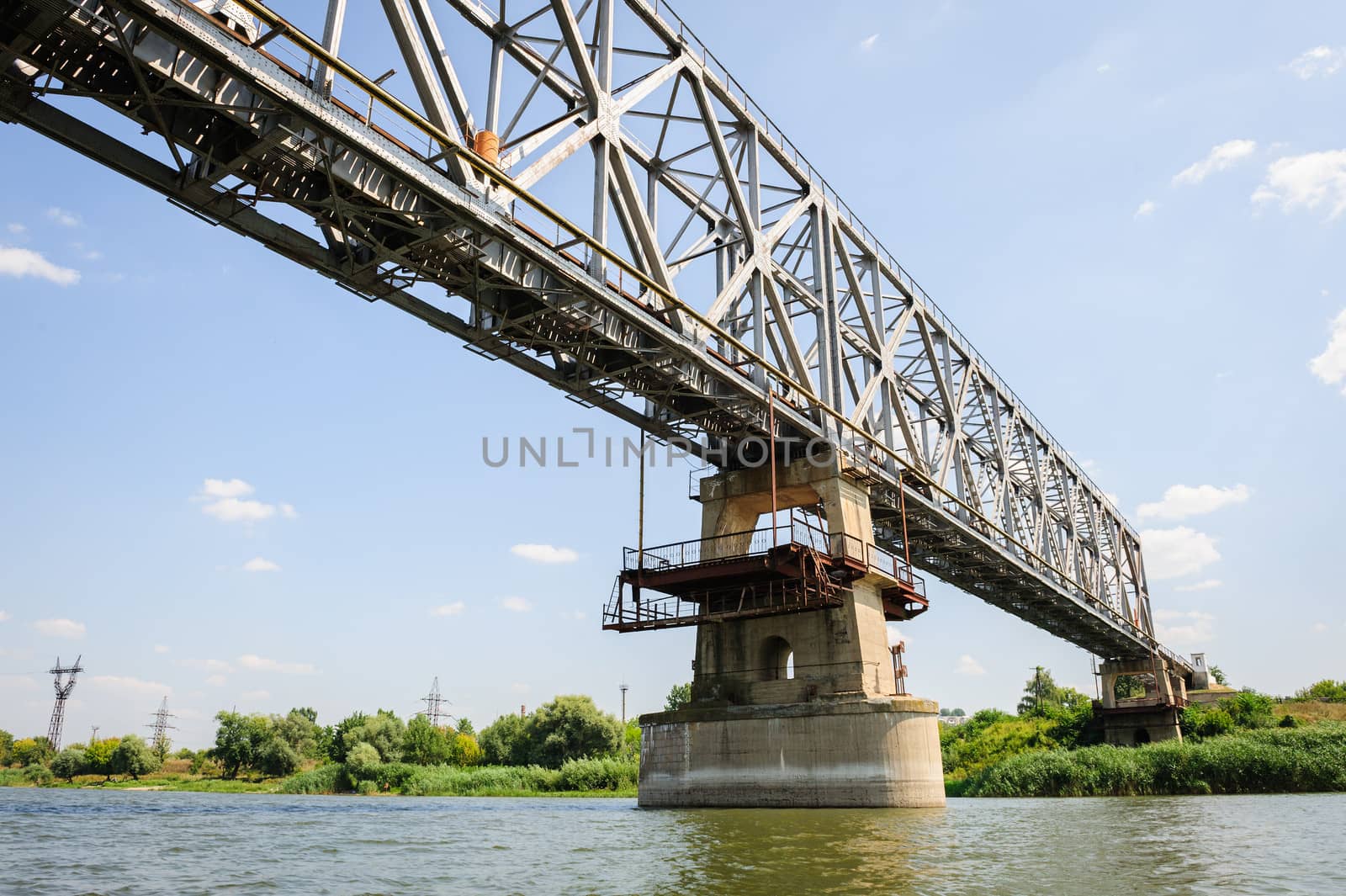 Old abandoned railroad bridge across the Dniester near Ribnita, Moldova