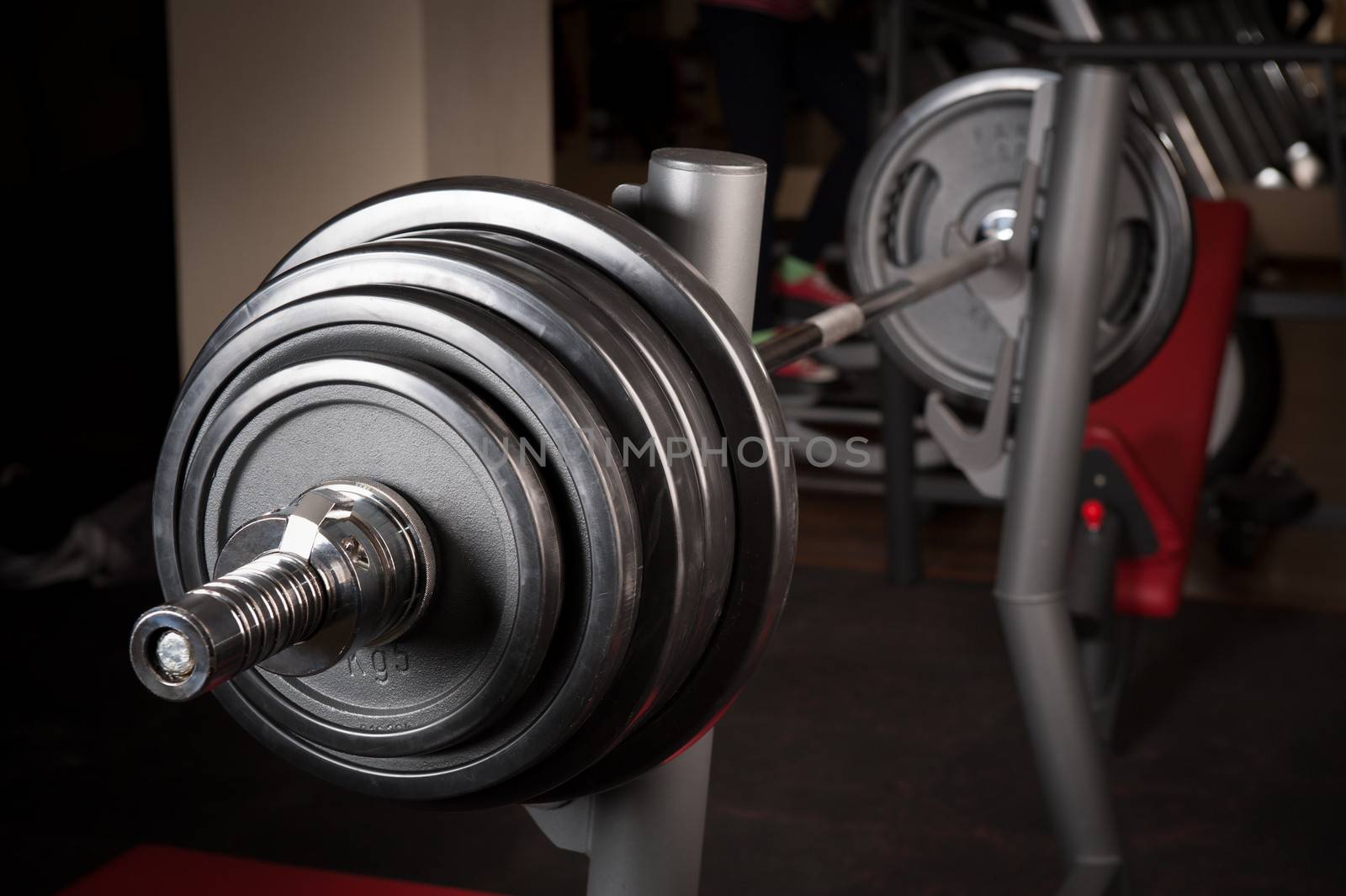 Barbell ready to workout, indooors, shallow DOF