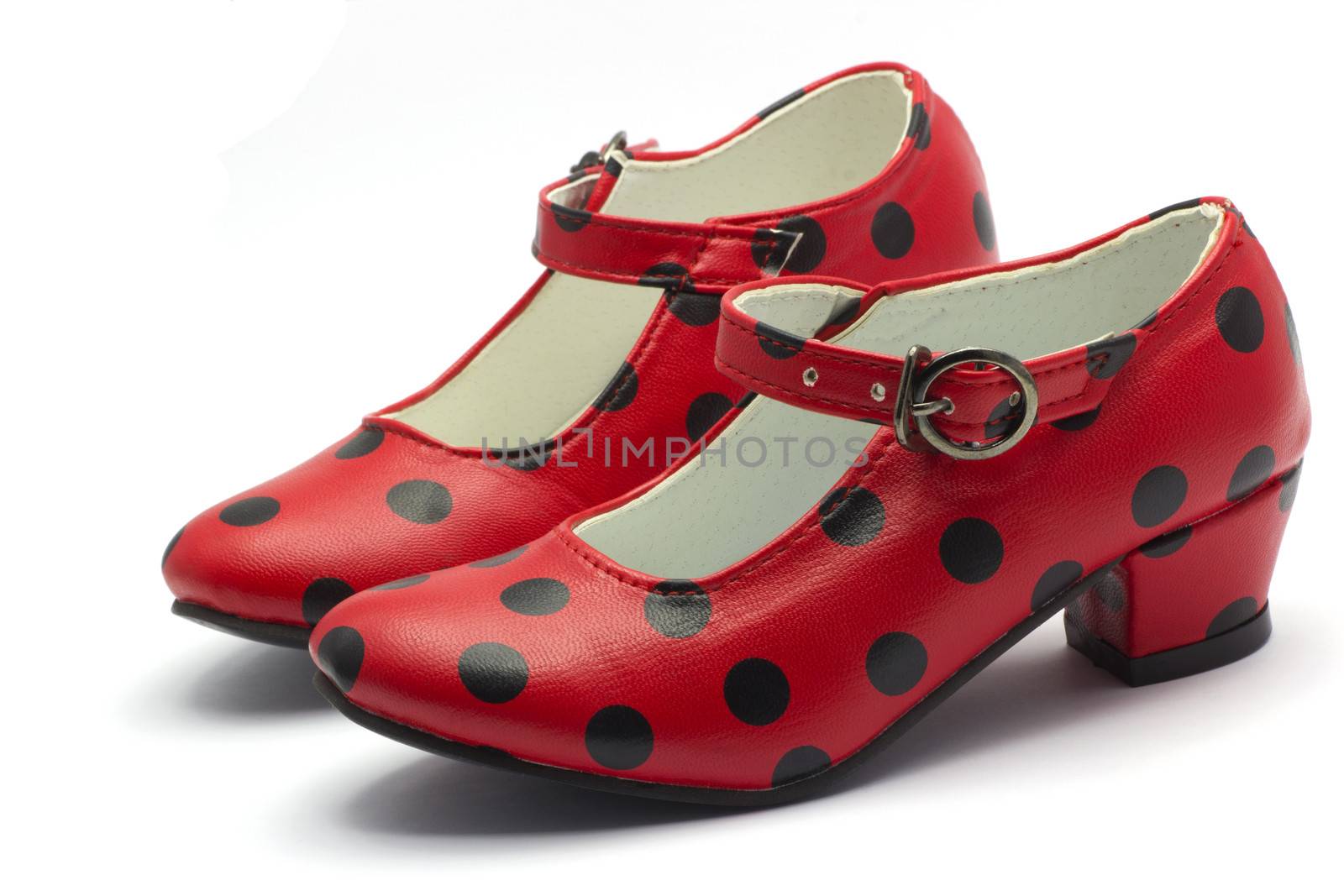 Pair of Sevillian flamenco dancing shoes.
Red shoes with black dots