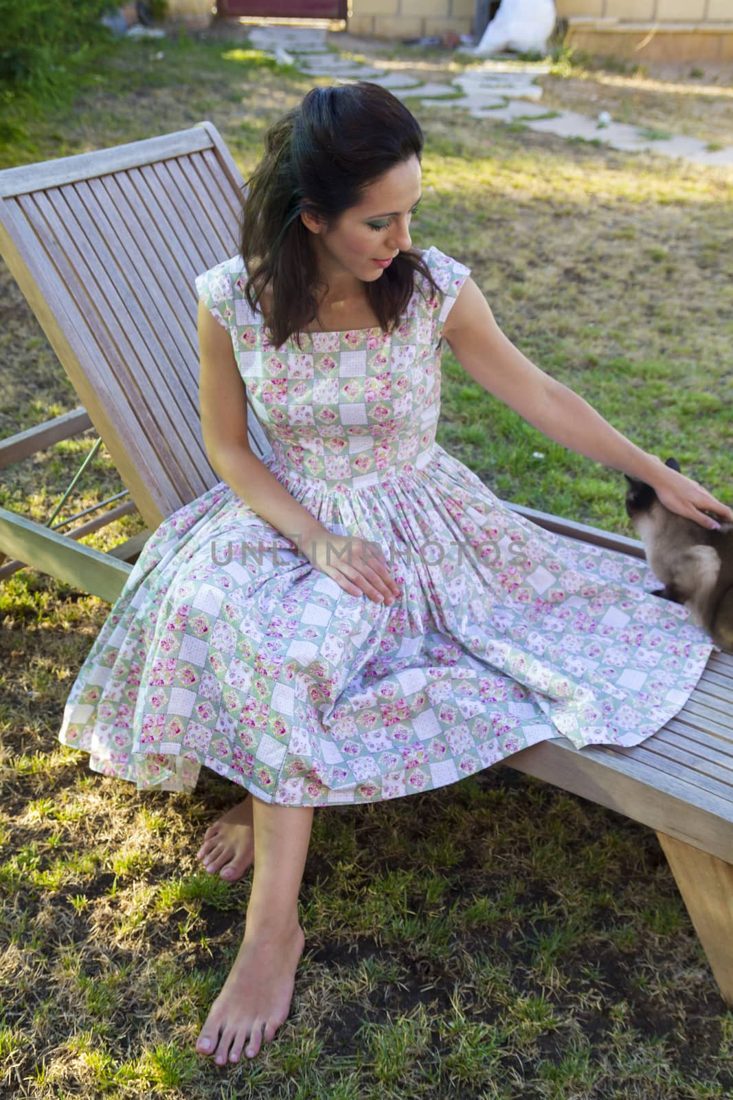 Woman gardening. Mature girl gardening in her backyard. spring season, rural scene