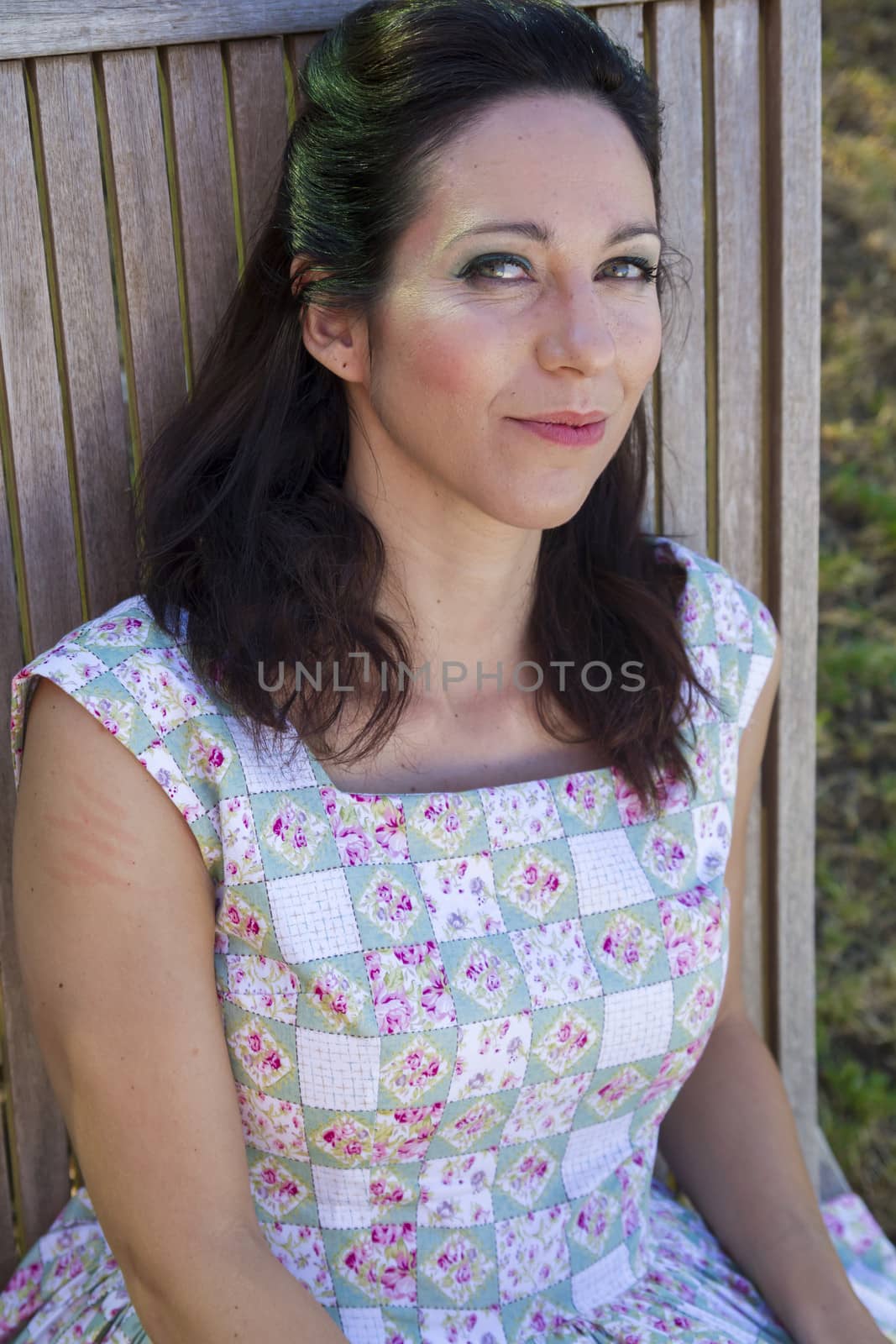 Woman gardening. Mature girl gardening in her backyard. spring season, rural scene