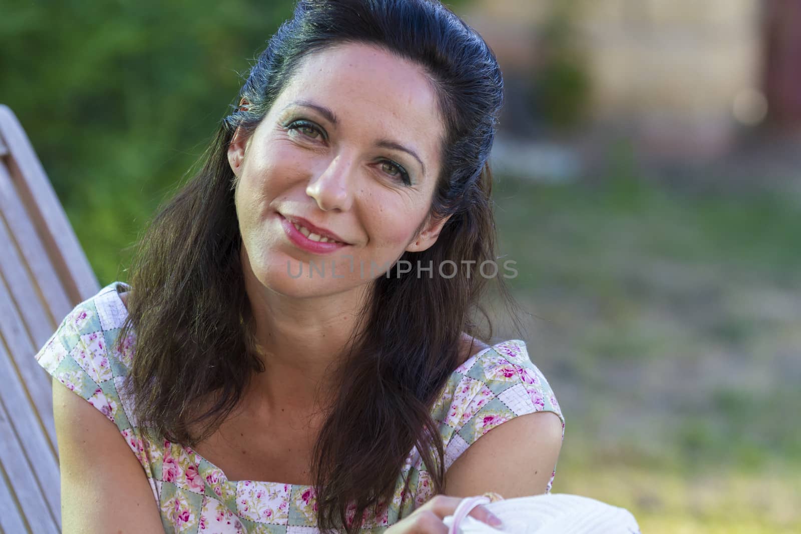 Woman gardening. Mature girl gardening in her backyard. spring season, rural scene