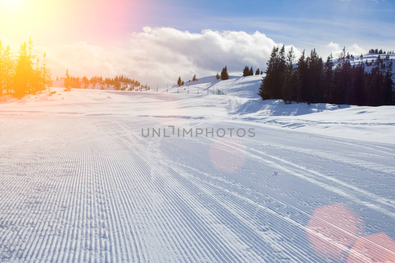 Sunny slope on the skiing resort. Austria.