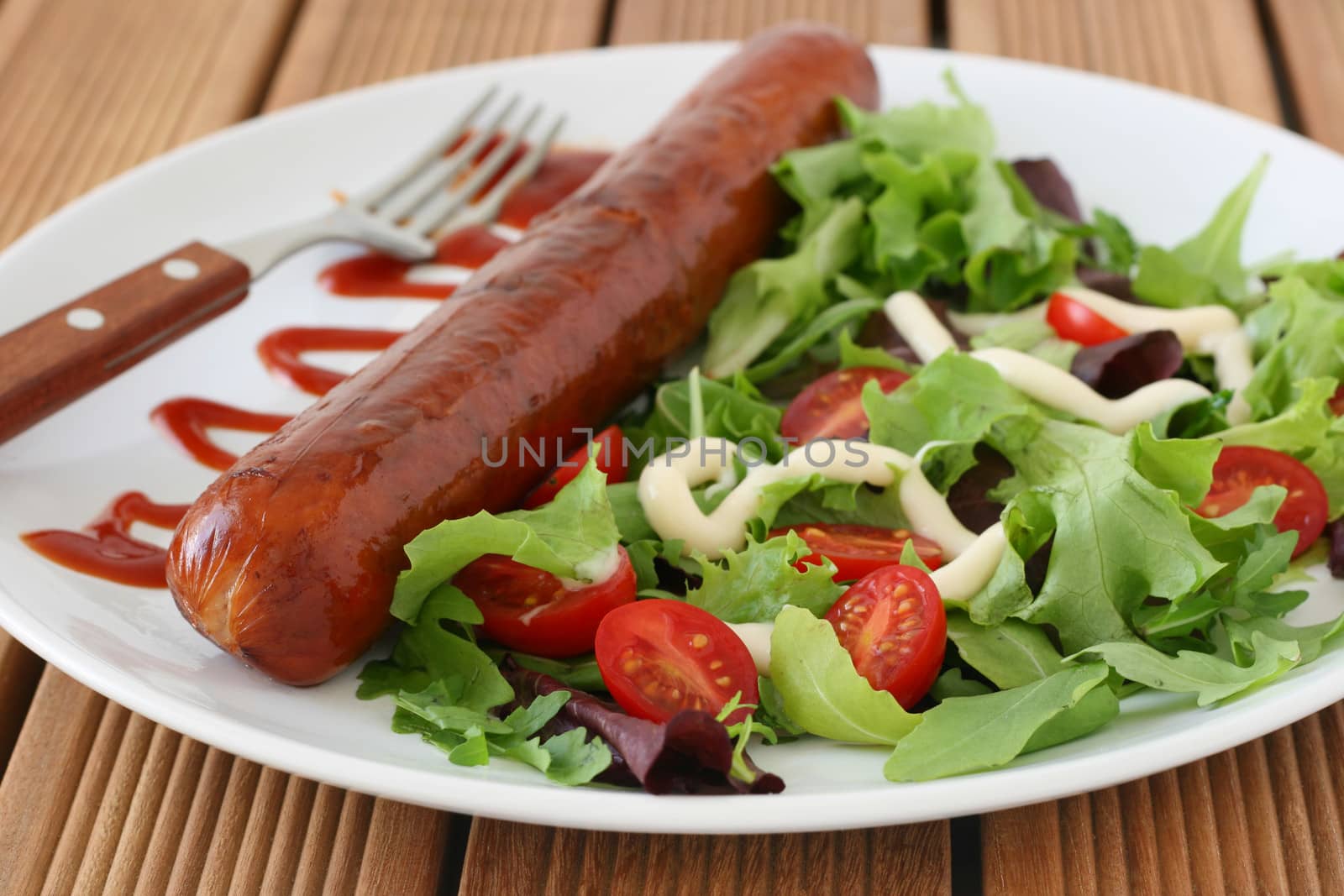 fried sausage with salad by nataliamylova