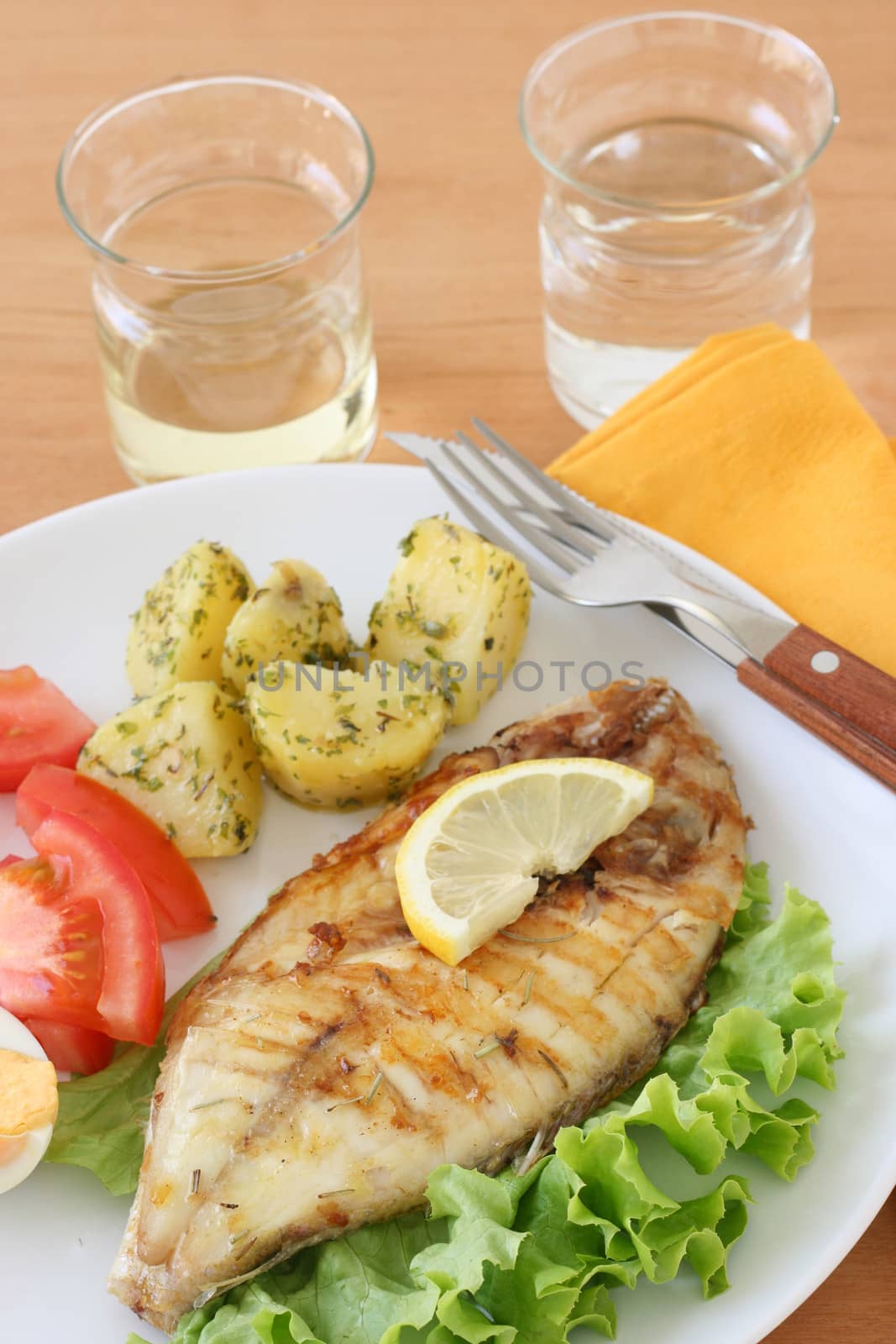 grilled fish with potato and salad by nataliamylova