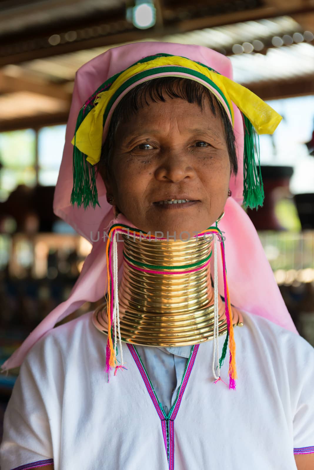 INLE LAKE, MYANMAR (BURMA) - 07 JAN 2014: Unidentified Padaung (Kayan Lahwi) tribe woman poses for a portrait. This tribe is called "long neck"���� because of metal rings around their necks.
