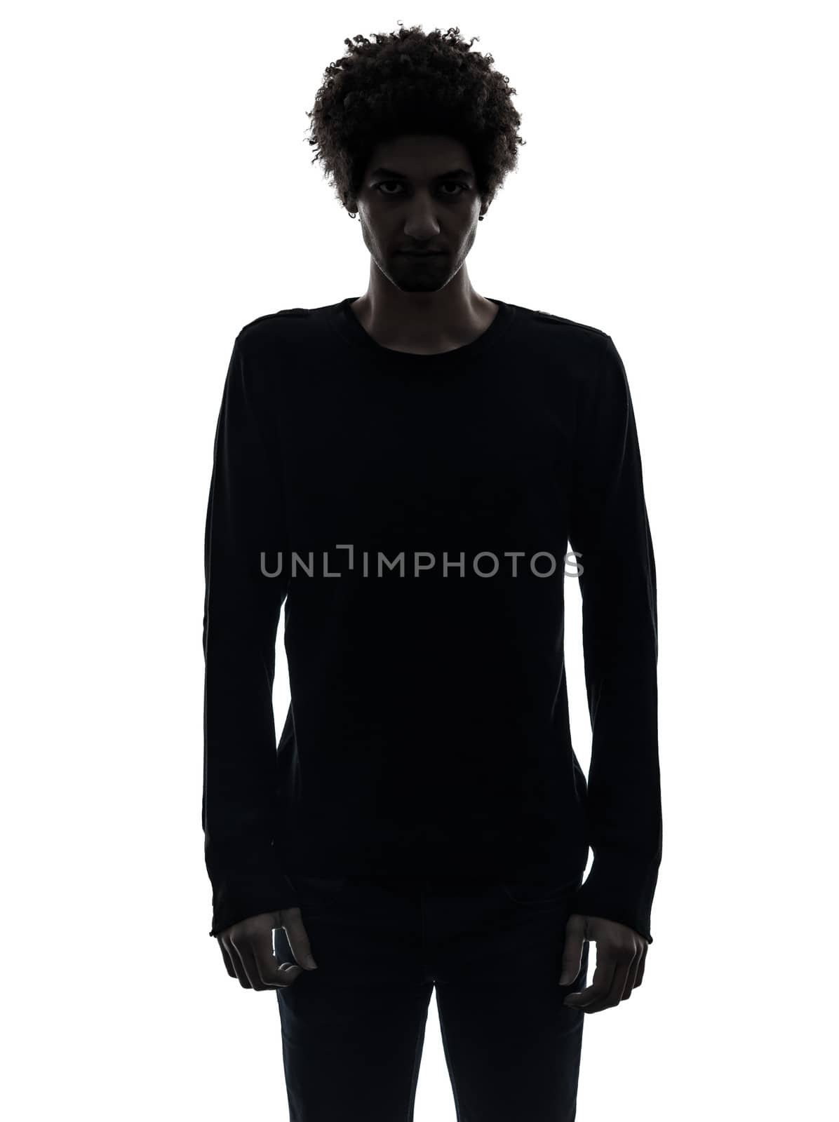 one african handsome serious young man in silhouette studio isolated on white background
