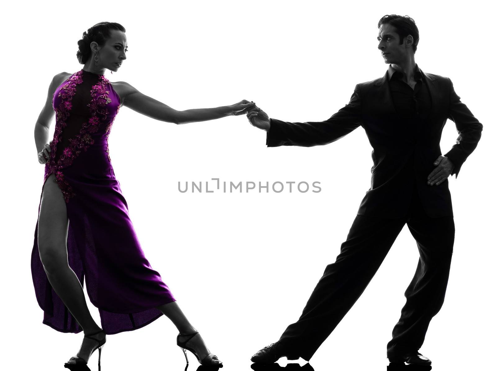 one caucasian couple man woman ballroom dancers tangoing in silhouette studio isolated on white background