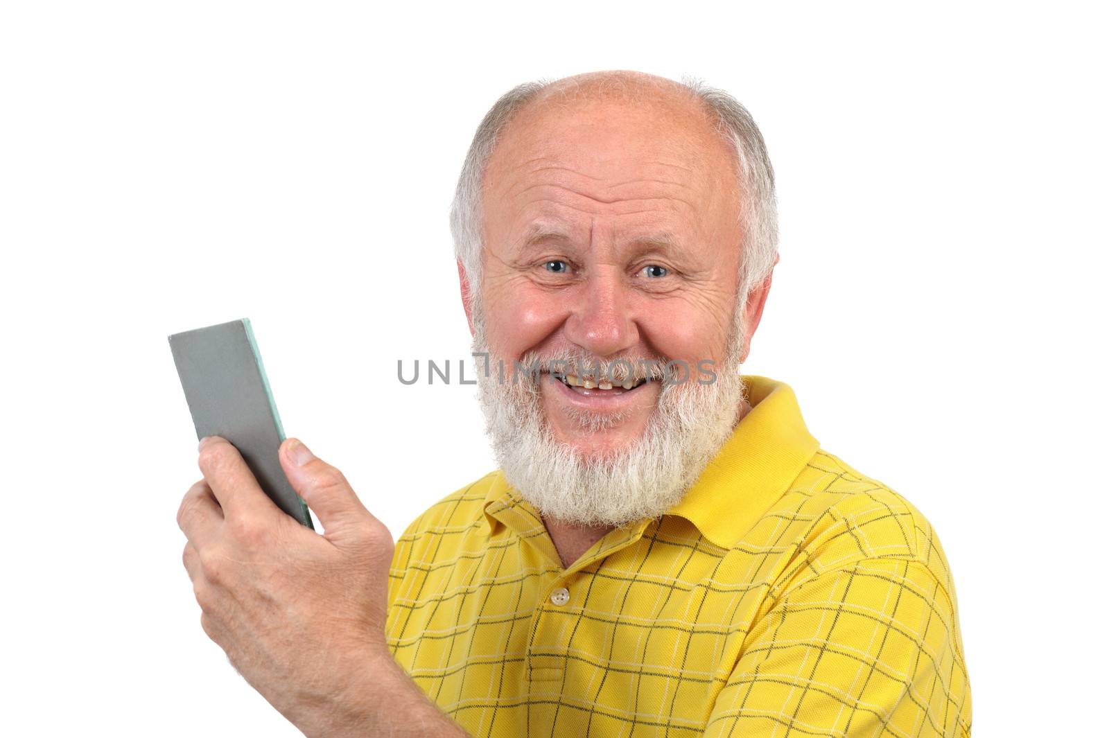 smiling senior bald man with mirror and bad teeth