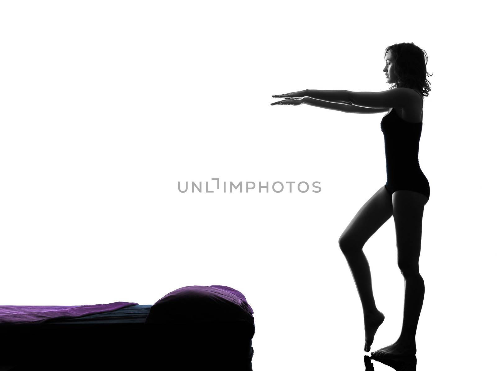 one woman sleepwalking silhouette studio on white background