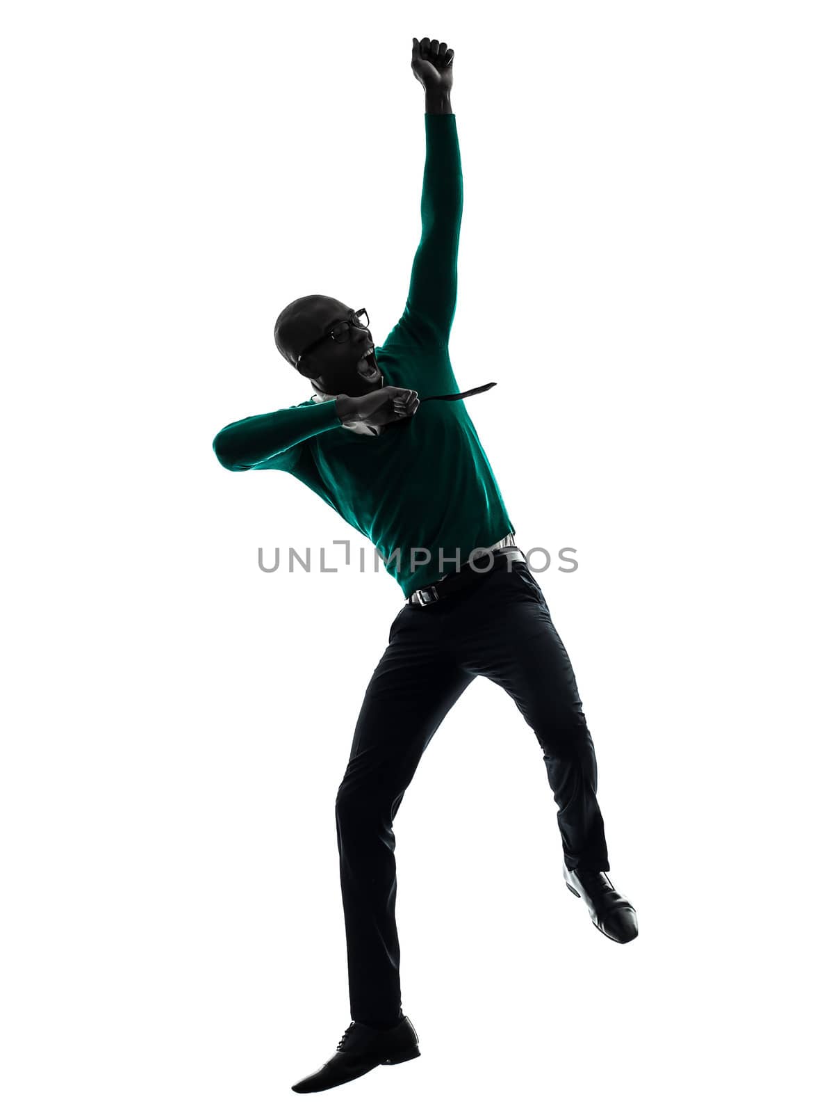 one african black man jumping happy in silhouette studio on white background