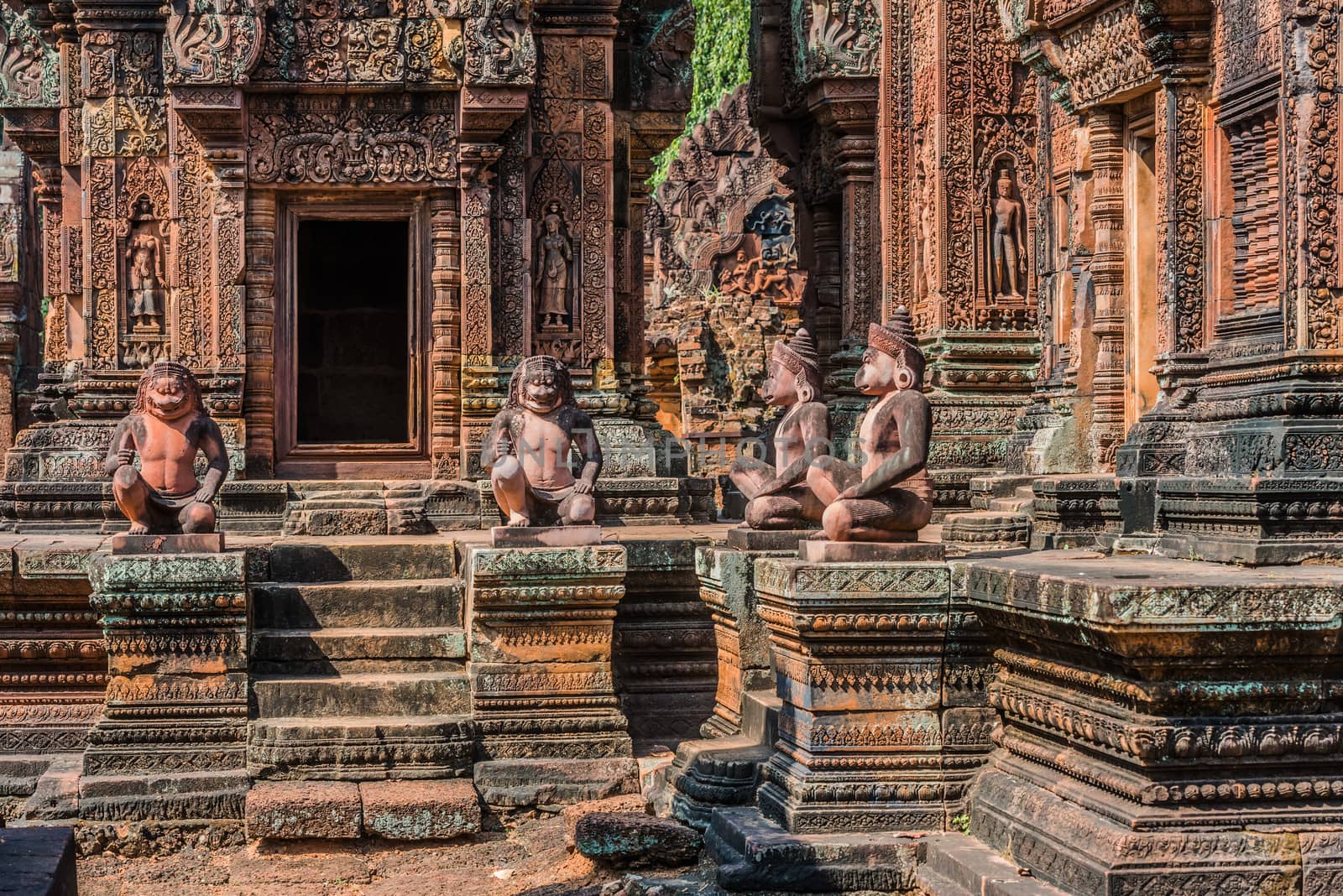 monkey statues Banteay Srei hindu pink temple cambodia by PIXSTILL