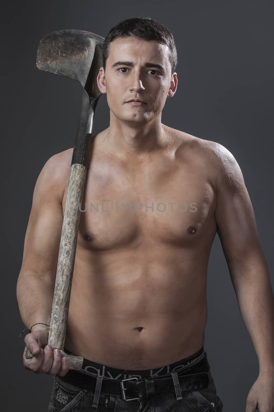 Industrial, Male worker holding a shovel, sexy builder by FernandoCortes