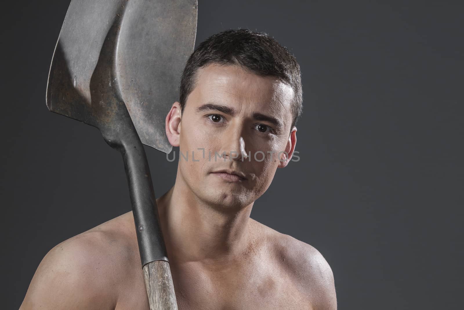 Industry, Male worker holding a shovel, sexy builder by FernandoCortes