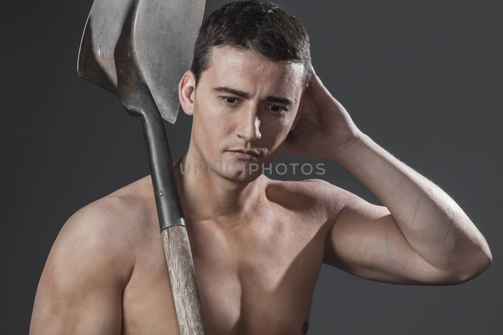 Repair, Male worker holding a shovel, sexy builder by FernandoCortes