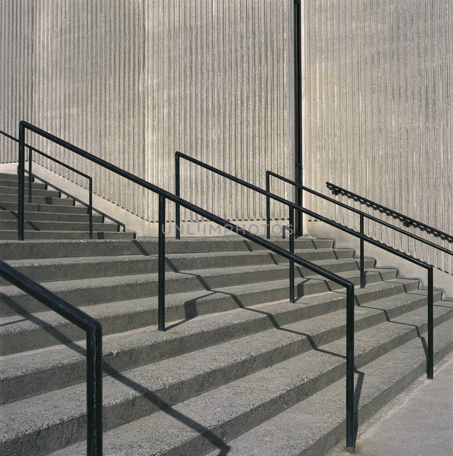 Concrete steps and iron railings by mmm