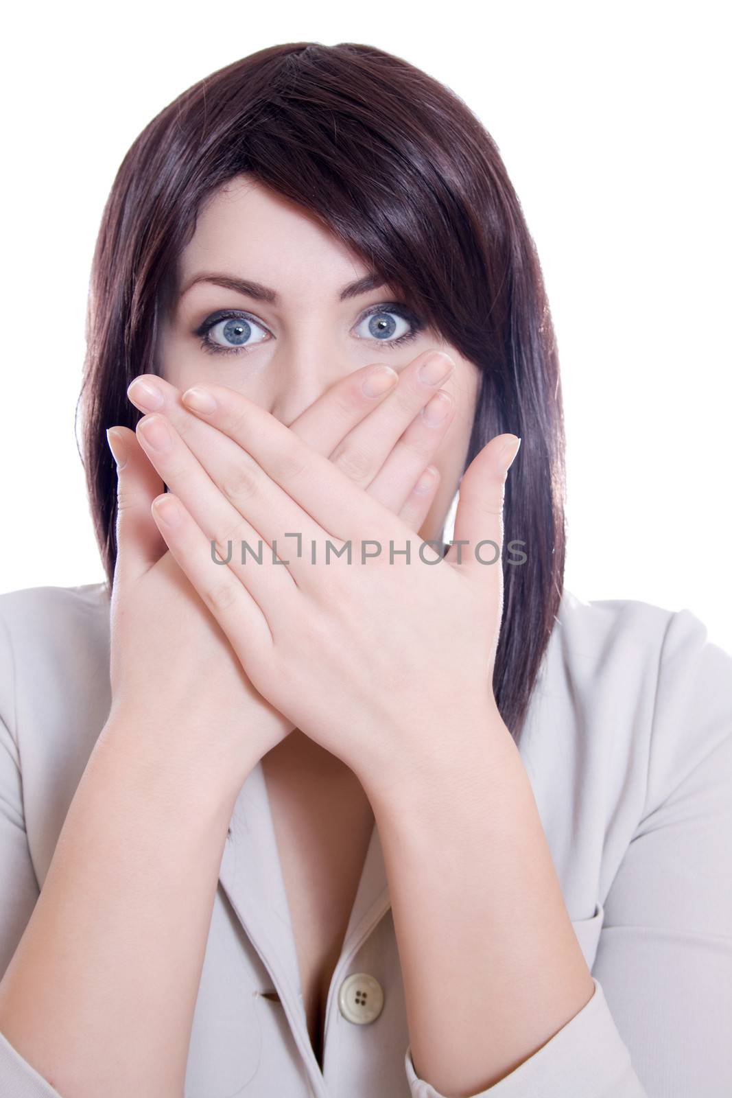 beautiful brunette woman covering her mouth with her hands