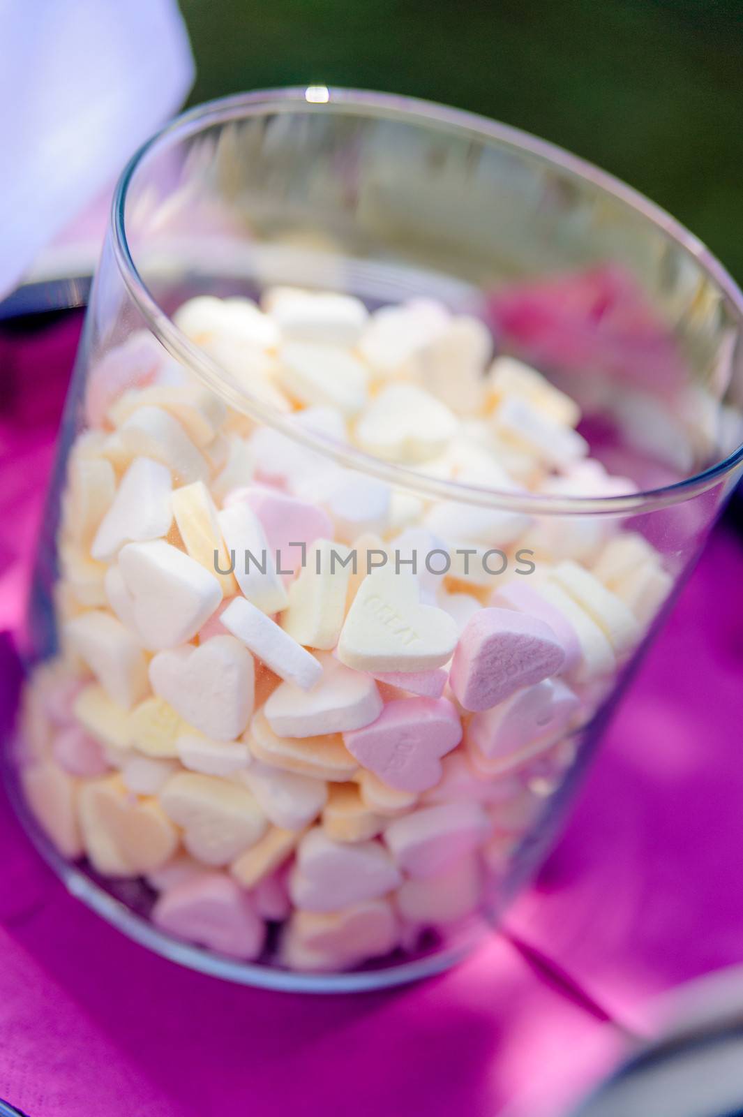 Colorful Candy Conversation Hearts in a glass bottle