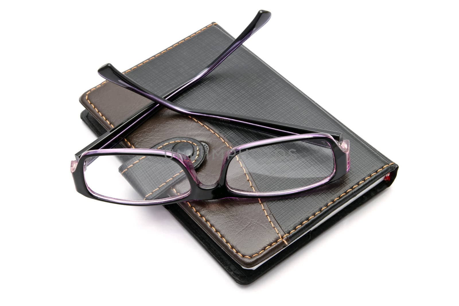 notebook and glasses isolated on white background 