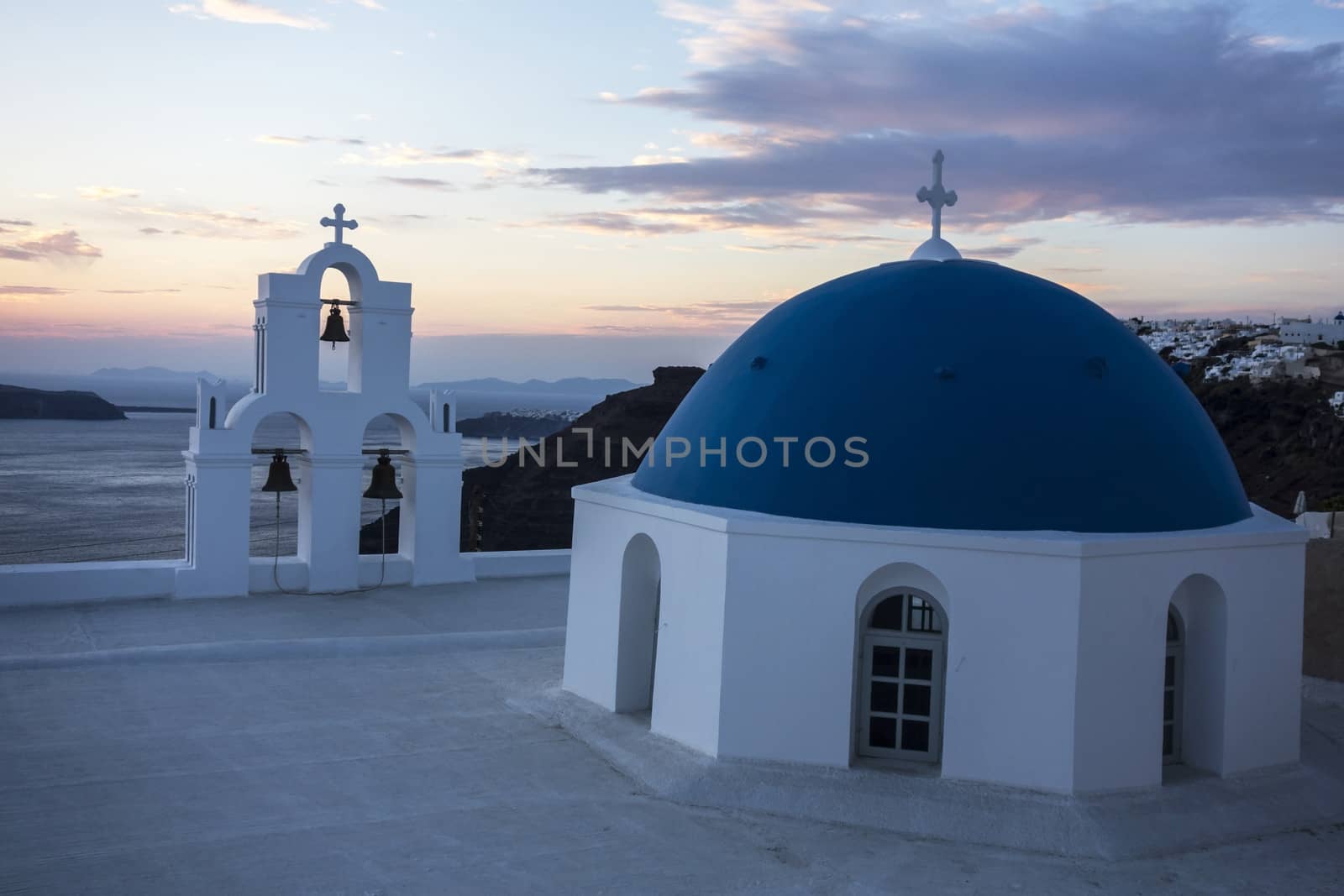 Sunset in Santorini church (Firostefani), Greece