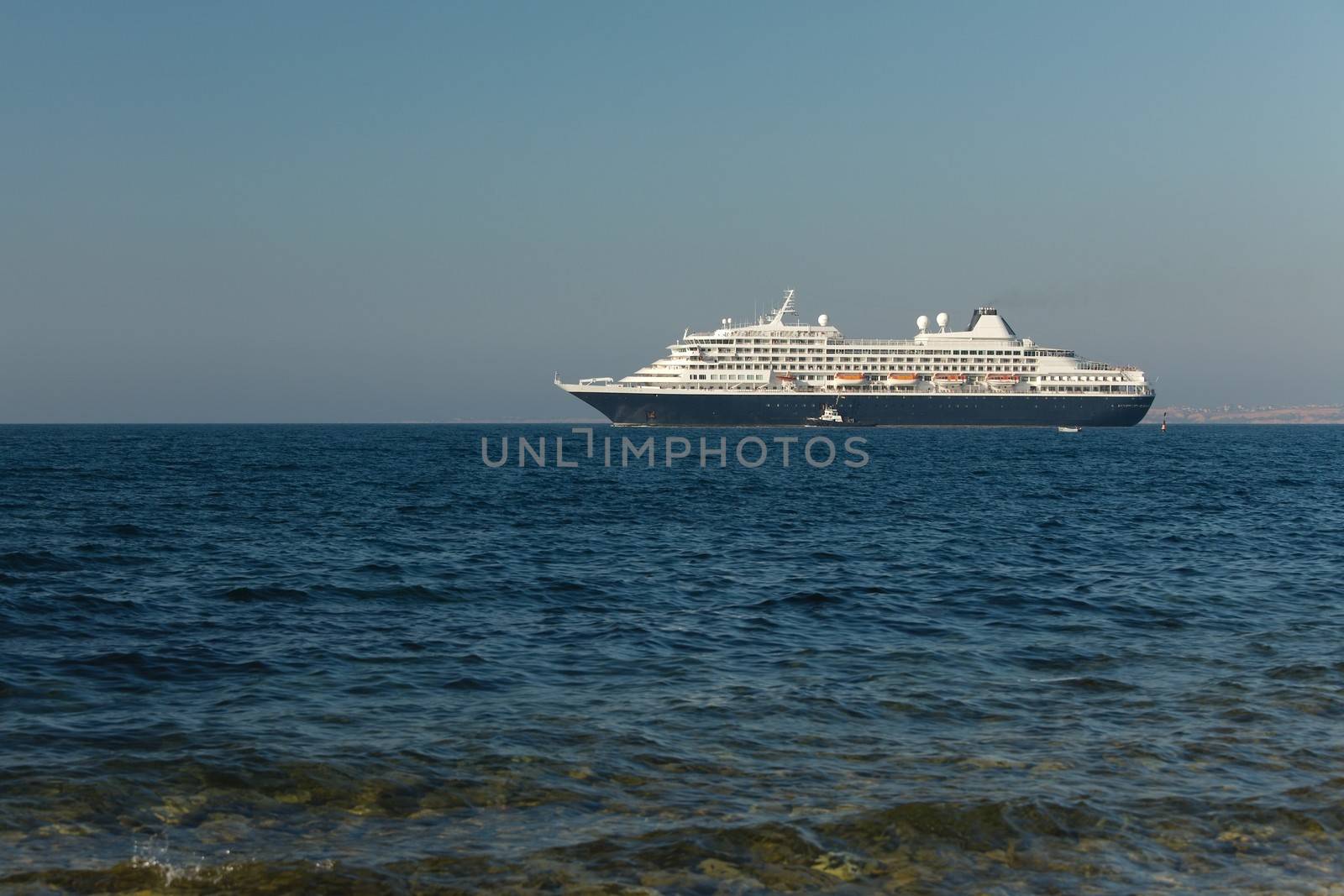 Cruiseship heading out at the sea