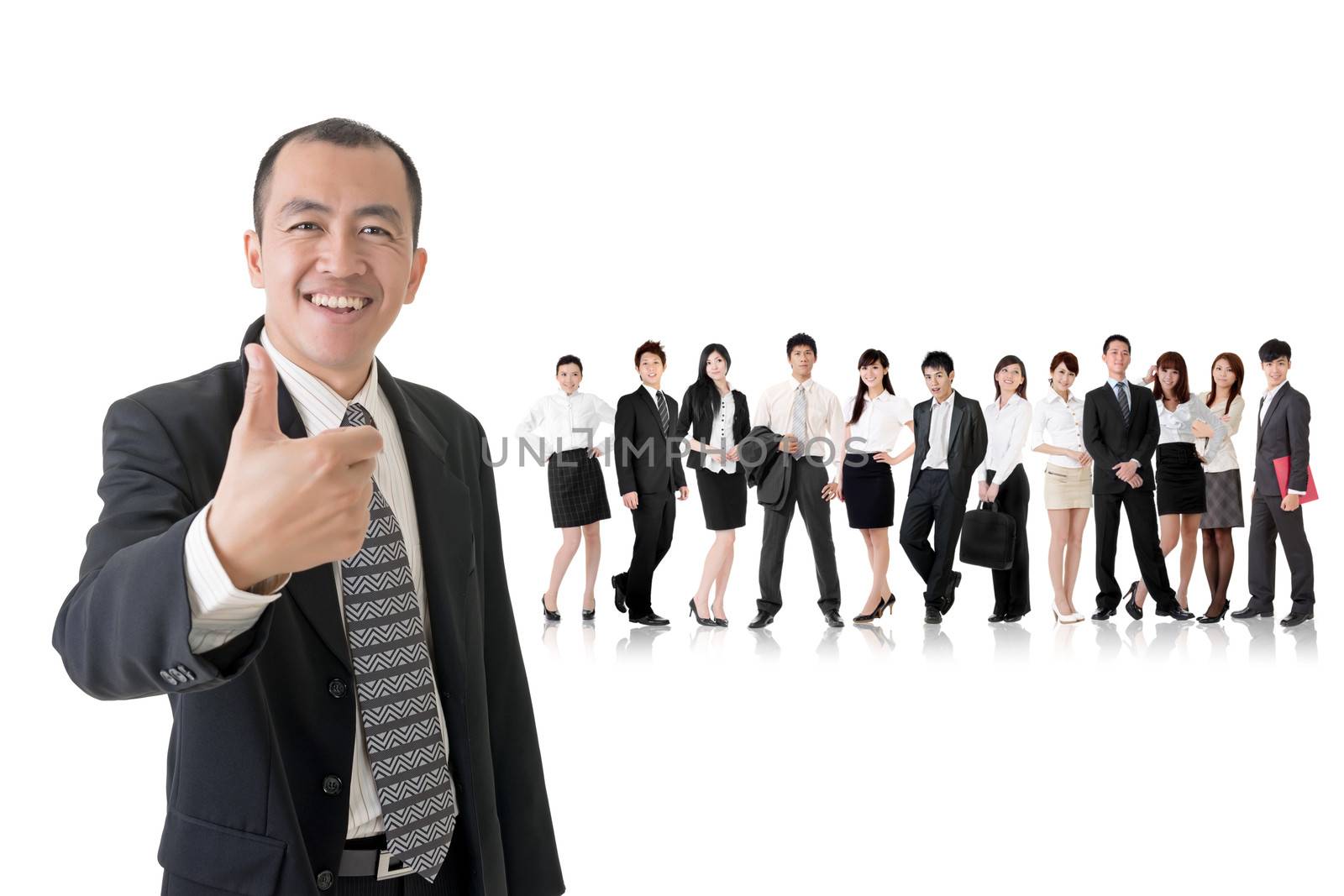 Mature businessman give you a gesture of excellent and standing in front of his team on studio white background.