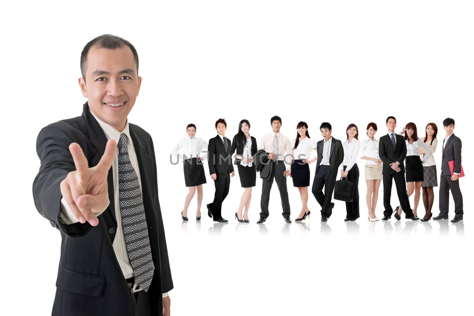 Mature businessman give you a gesture of peace and standing in front of his team on studio white background.