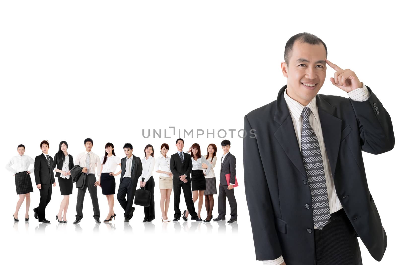 Mature businessman of Asian got an idea and standing in front of his team on studio white background.