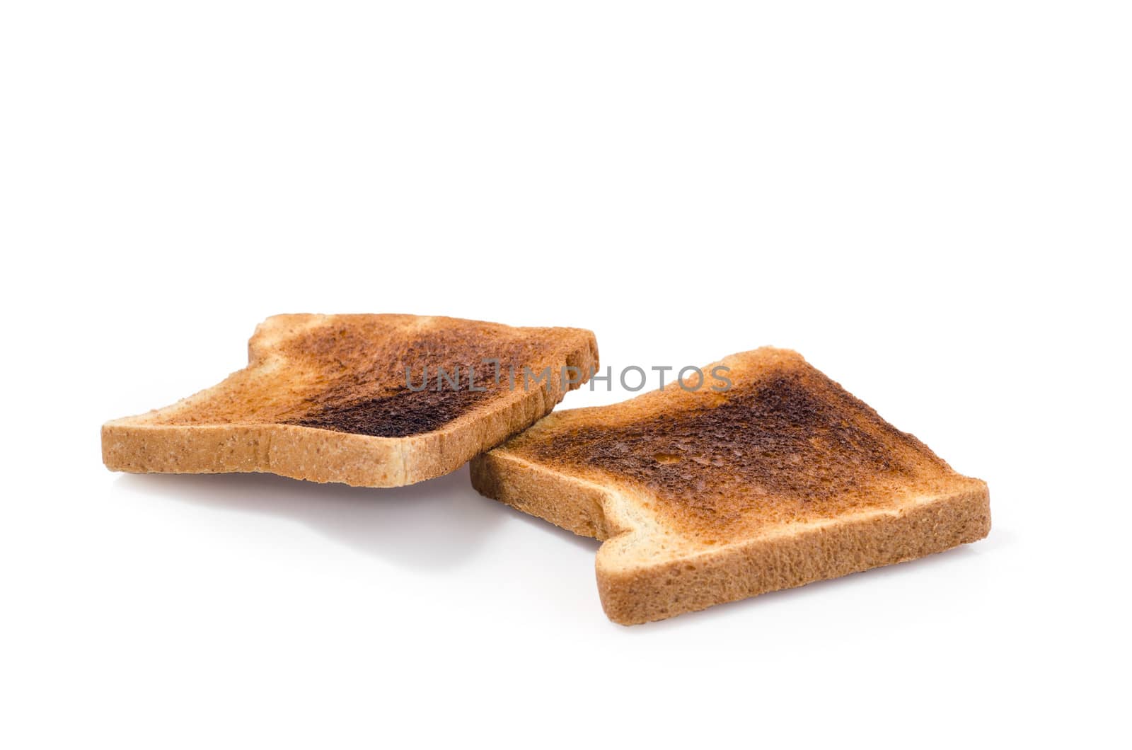 two pieces of Burnt Toast  on  white background by 9george